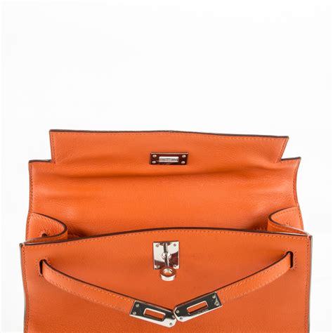 hermes orange clutch|Hermes clutch for women.